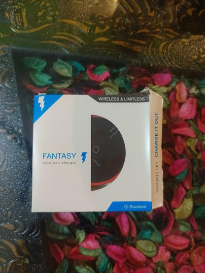 Fantasy wireless charger box on a colorful fabric background
