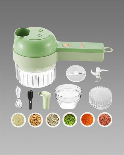 Green kitchen chopper with attachments and food samples on a gray background